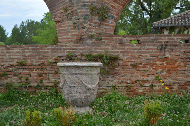Historic Vase of Anduze in a garden setting